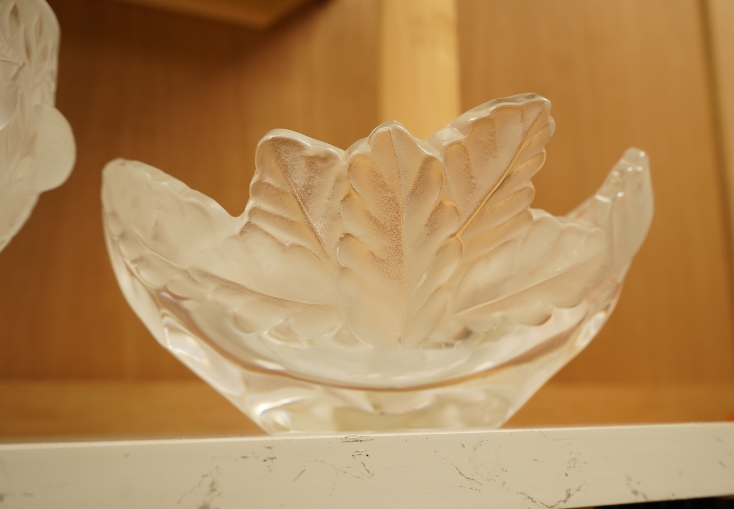 Three lalique glass pieces comprising an 'Elisabeth' vase, a 'Compiegne' dish and a 'Nugent' bowl, each signed, largest 19cm wide